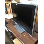 A Toshiba 32WLT66s LCD 32" tv with remote.