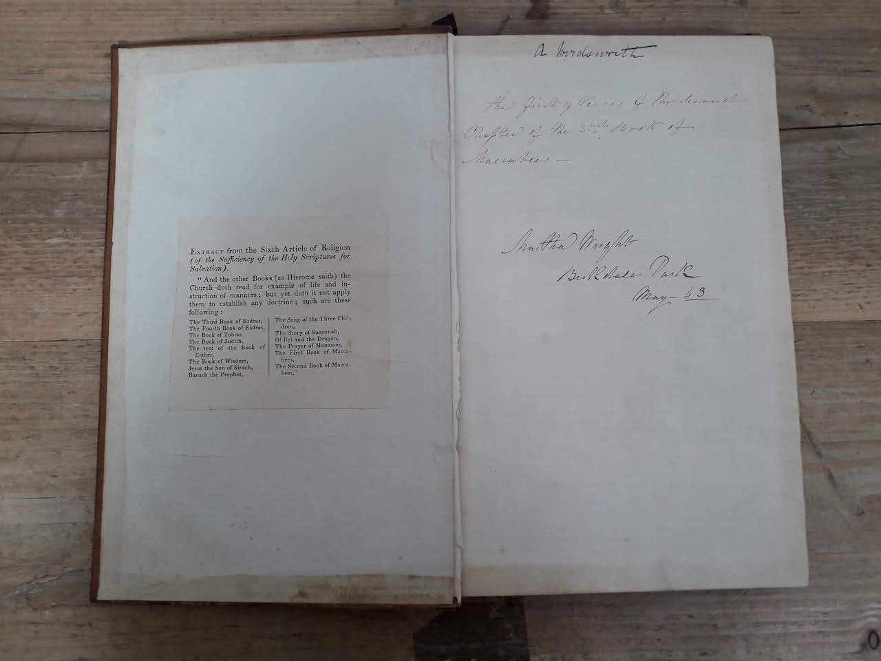 A 19th century Apocrypha, with inscription on first page and signature 'A. Wordsworth'