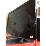 Samsung TV with remote, model LE32C450E1W