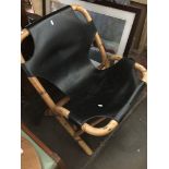 A cane and leather chair