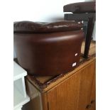 A leather effect footstool