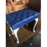 A dressing table stool