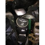 Bag of golf clubs with trolley