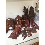A collection of treen including masks
