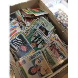 A box of 1970s football cards