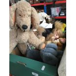 Box of various soft toys including dolls