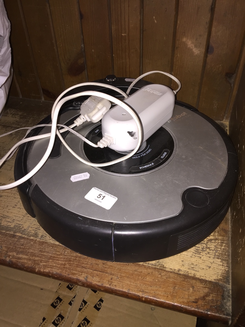 An Irobot Roomba robot vac