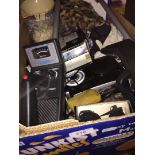 A box of misc including 2 metal detectors, a radio, a videocamera, soft toy, etc.