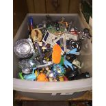 A tub of Imaginex and Hit Wheels toys