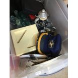 A large crate of mixed items including old advertising bottles, model cars, stein, metalware, a