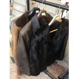 A fur jacket, a gents suede jacket and a sheepskin coat