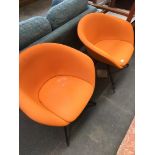 A pair of retro Arper tub chairs