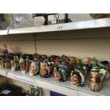 A colection of 39 small Royal Doulton character jugs, and a Sylvac ceramic Leprechaun