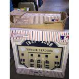 A box of Yankee Stadium commemorative plaques.