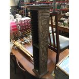 An African style CD rack, an artist's easel and a brass bound magazine rack.