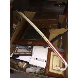 A box of various picture frames, etc.