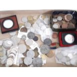 A mixed lot of various coins and commemorative medallions.
