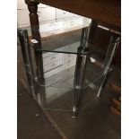 A clear glass tv stand