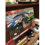 A boxed MicroScalextric Pro Driver game set.