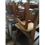 A set of four dining chairs