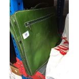 A green leather messenger bag