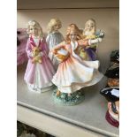 Four Royal Doulton figures - Daddy's Joy HN3294, Faith HN3082, Hope HN3061, and Charity HN3087
