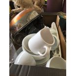 A box of crockery, glasses, pans, etc