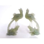 A pair of carved jade ornaments, height 22cm.