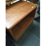 A Danish teak low cabinet on castors