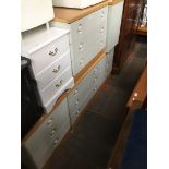 A four piece Stag bedroom suite to include a dressing table, sideboard, chest of drawers and linen