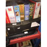 A box of jigsaws and portable jigsaw board