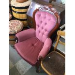 A reproduction continental style button back chair