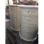 A pair of painted bedside units