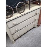 A painted chest of drawers