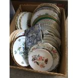 A box of collectors plates