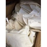 A box of misc vintage clothing items.