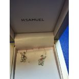 A boxed pair of Playboy Bunny earrings