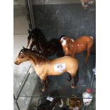 Three large Beswick horses including Highland