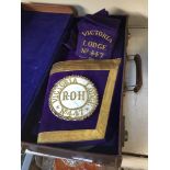 A case containing Masonic type regalia marked Victoria Lodge No 447