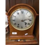 Domed oak chiming mantel clock
