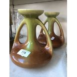 A pair of French twin handled vases