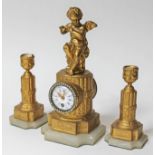 A late 19th century clock garniture, height 28cm.