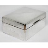 A hallmarked silver cigarette box, length 11cm.