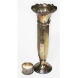 A hallmarked silver vase, height 26cm, wt. 4oz, together with a hallmarked silver serviette ring.