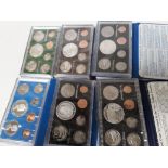 Six New Zealand Coin Issue proof sets, each including a silver dollar, various dates late 1970s/