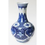 A Chinese blue and white porcelain bottle vase, bearing double ring mark to base, 20th