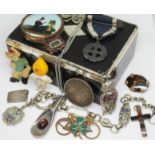 An Art Deco style box and contents including a modernist pendant on chain, an Albert chain,