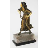An Art Deco 'bronzed' spelter figure with ivorine face and limbs on marble base, height 20cm.