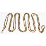 A Victorian guard chain, length 152cm, both chain and clasp marked '9c', wt. 39.01g. Condition -