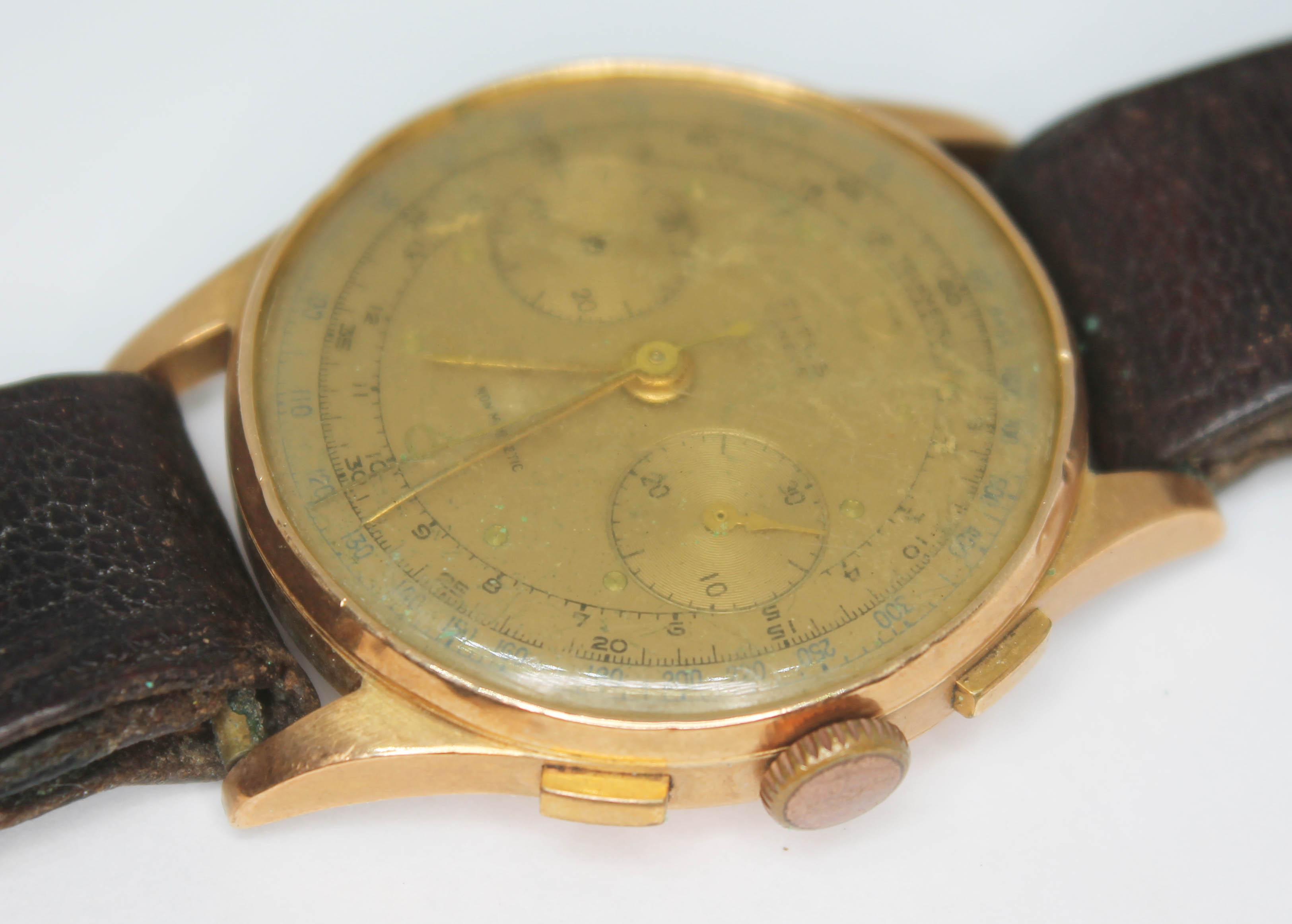 A vintage Titus Geneve chronograph, circa 1940s, having signed copper coloured dial with